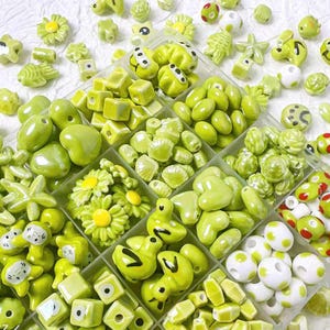 2 st söta handmålade keramiska pärlor DIY-pysselmaterial - stjärnor, fiskar, blommor och mer