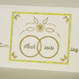 Grußkarte zum Hochzeitstag mit feiner goldfarbener Fadenstickerei