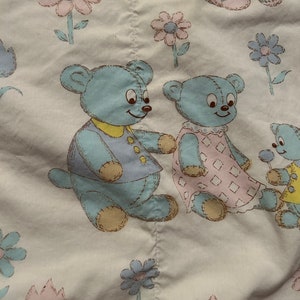 Handmade Baby Quilt Toddler Crib Quilt Nursery Rhyme Pattern Quilt Fabric Soft muted colors, light yellow backing Vintage 1960-70s