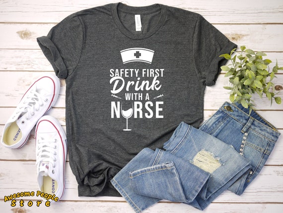 Safety First Drink With A Nurse T-Shirt Nursing Nurse RPN RN Wine Glass Nurses Cap Funny Nurse Shirt Family Mens Ladies Womens T-shirt