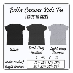 May include: Bella Canvas Kids Tee size chart showing width and length measurements in inches for sizes S, M, L, and XL. The chart shows three color options: black, dark grey heather, and light grey heather.