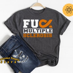 May include: Dark gray t-shirt with white text that reads "F**k Multiple Sclerosis" and an orange ribbon.