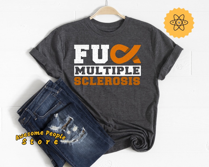 May include: Dark gray t-shirt with white text that reads "F**k Multiple Sclerosis" and an orange ribbon.