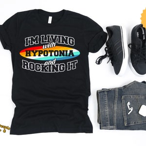 Camisa Hipotonia, Suporte para Hipotonia, Conscientização sobre Hipotonia, Estou Vivendo com Hipotonia e Arrasando, Camiseta Mama Of A Warrior, Hipotonia Unissex