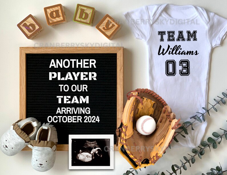 Celebrate the newest addition to your lineup with our Baseball Baby Announcement,festures custom text baby onesie, shoes, baseball glove holding a baseball. Custom ultrasound photo and text on felt letter board. Cute baby shoes and blocks.