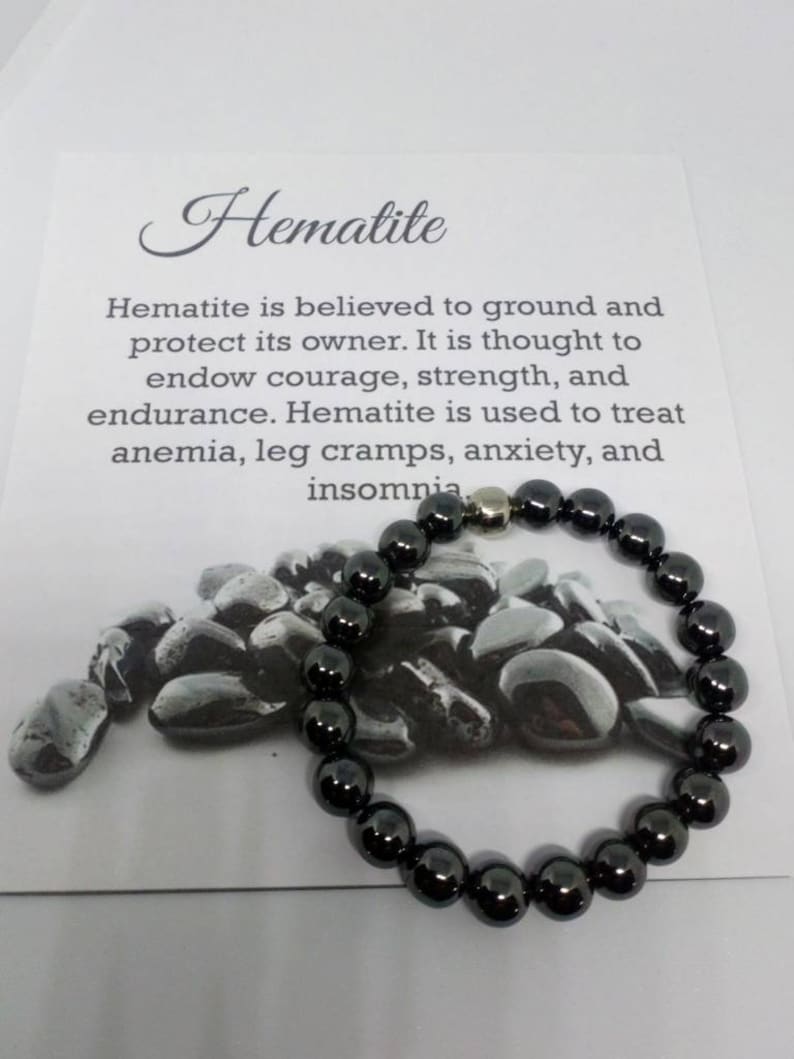 May include: Hematite bracelet with black beads and a silver magnetic clasp. Hematite is believed to ground and protect its owner. It is thought to endow courage, strength, and endurance. Hematite is used to treat anemia, leg cramps, anxiety, and insomnia.