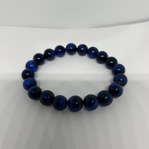 ディープブルータイガーアイ12mmの宝石ビーズ。数量限定。伸縮性のある様々なサイズでオーダーメイド。