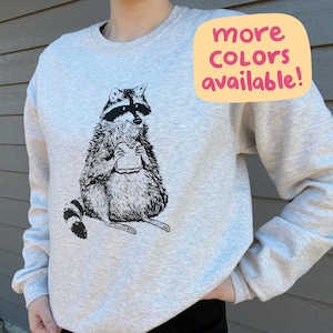 Raccoon sweater store