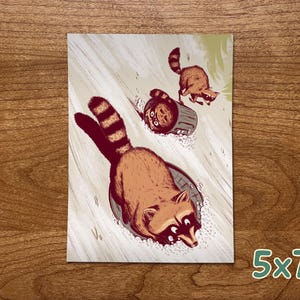 Raccoon Art Print, Winter Artwork, Raccoon Gifts, Funny Raccoon, Sledding Decor, Funny Animal Prints, Raccoon Illustration, Wildlife Art Small 5x7"