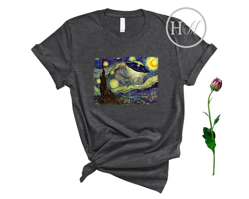 May include: A dark gray t-shirt with a print of Vincent van Gogh's Starry Night with a UFO flying over the town.