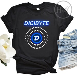 May include: Black t-shirt with a blue and white Digibyte logo and the text "DIGIBYTE" in blue.