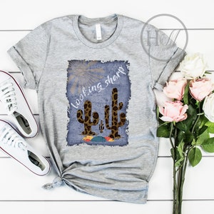 May include: Gray t-shirt with a distressed graphic of two leopard print cacti and the text "looking sharp".