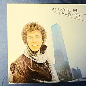LEO SAYER, World RADIO, Leo Sayer Record, Leo Sayer Album, Leo Sayer Lp, disques pop, vinyle vintage, Lp vinyle, disques vintage, disques 1982