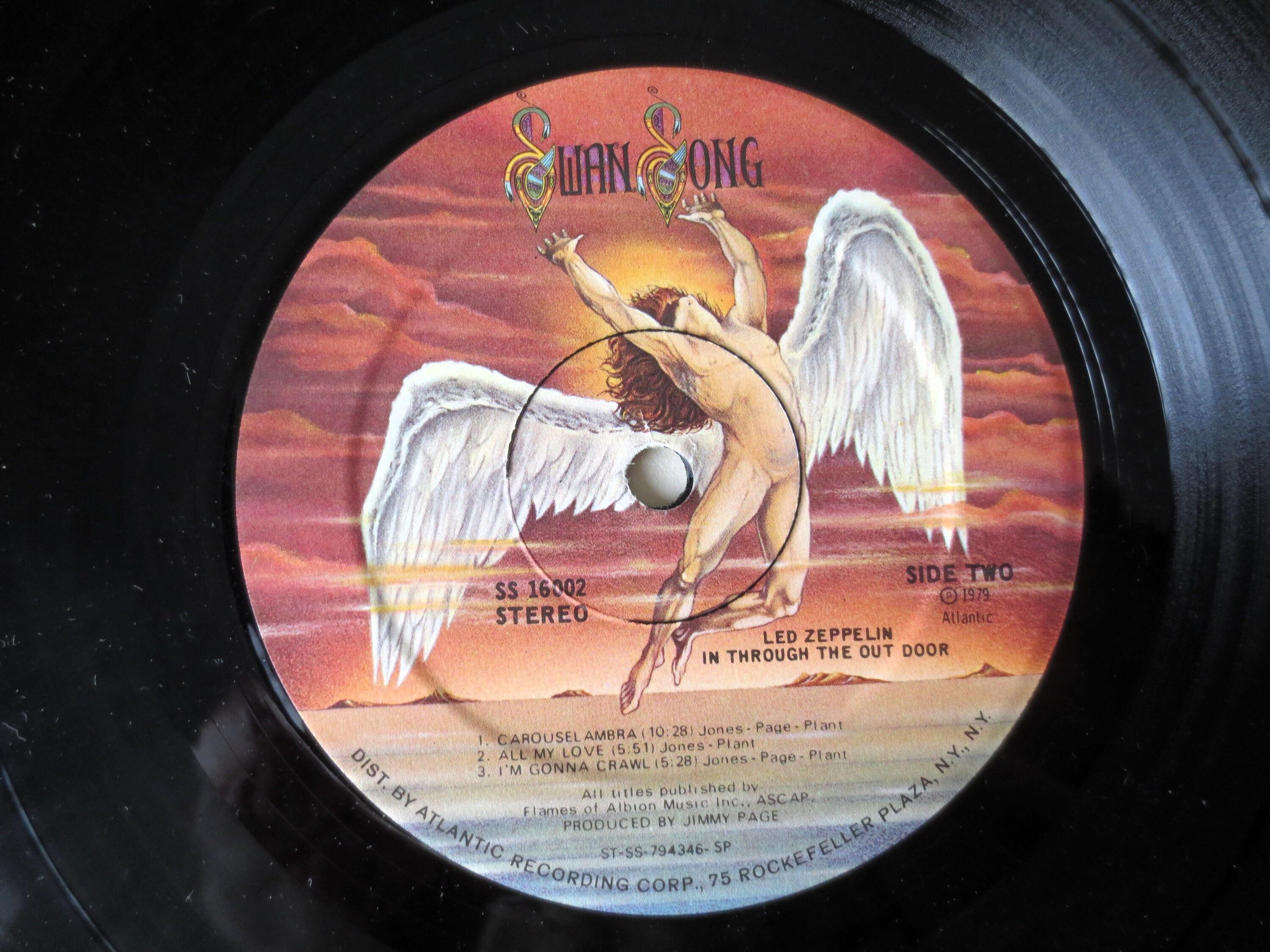 レコード新品同様! レッド・ツェッペリン 1979年 初版盤 インスルージアウト il_fullxfull.6943123315_bzkr.jpg