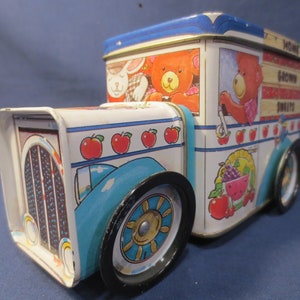 Camioncino giocattolo vintage in latta: pubblicità di dolciumi britannici, scatola di latta da collezione