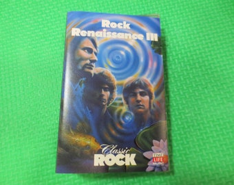 May include: A cassette tape cover with a blue and green background featuring a band with the title "Rock Renaissance III" and the logo "Classic Rock" from Time Life Music.