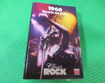 May include: A cassette tape cover featuring a photo of a woman singing into a microphone. The cover is red and white and says "1968 Shakin' All Over" and "Classic Rock" with the Time Life Music logo.