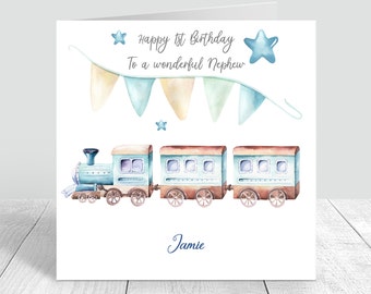 May include: A watercolor birthday card featuring a blue train with three carriages, a banner of pastel flags, and text that reads "Happy 1st Birthday To a wonderful Nephew" and the name "Jamie". The card has a white background.