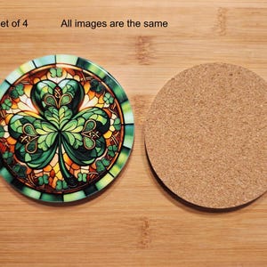 May include: Set of four round coasters. One coaster features a stained-glass design with a green shamrock, and the other is made of cork. The text "All images are the same" is visible.