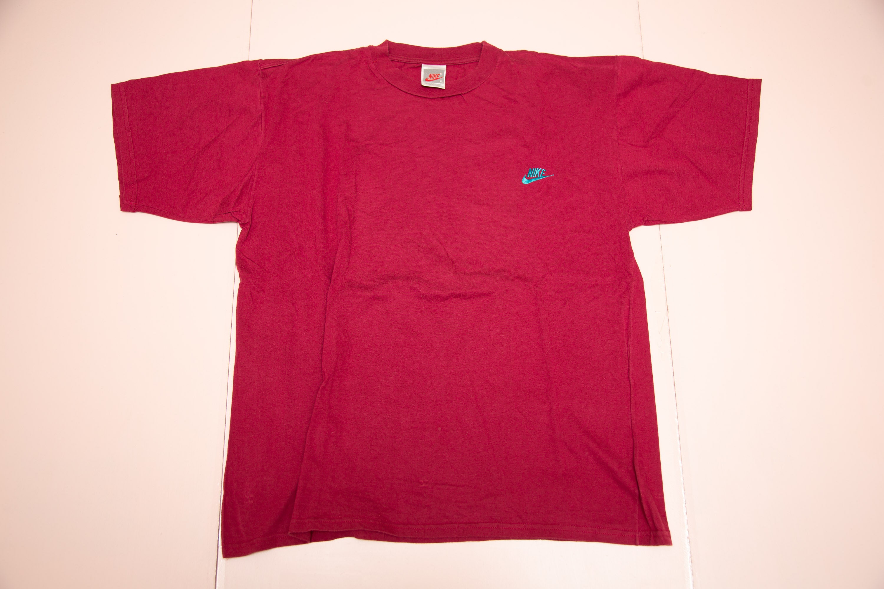 grey and red nike shirt