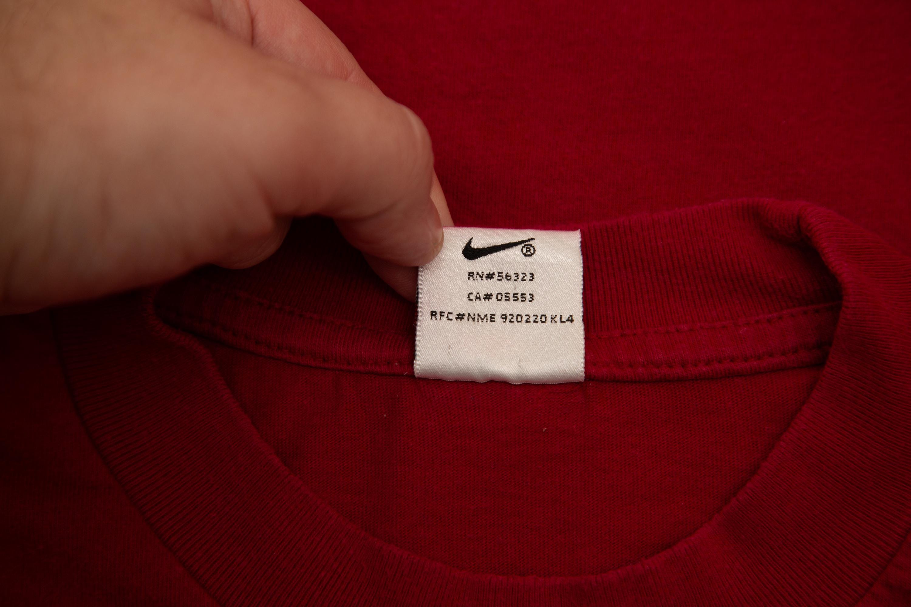nike red swoosh tag