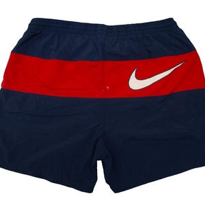red and blue nike shorts