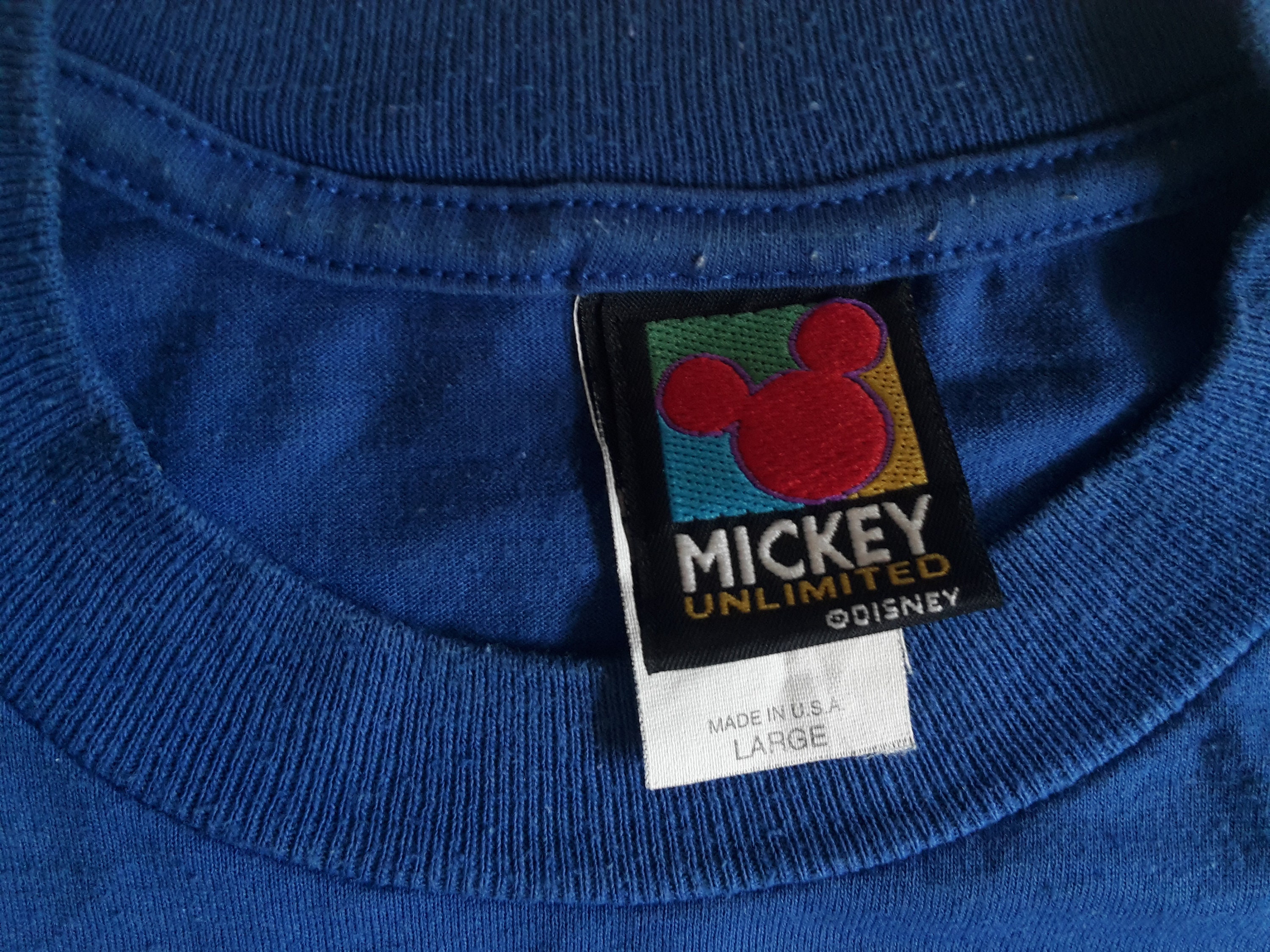 90年代ヴィンテージのMICKEY Unlimited Tシャツ。ディズニーユニバース