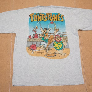 Vtg & molto raro The FLINTSTONES cartoon 90's grigia t-shirt, grafica bifacciale con grande tema baseball sul retro, taglia xl o L da uomo