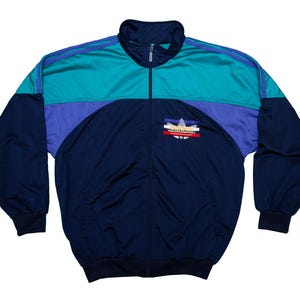 VTG ADIDAS 90's International Sports veste de survêtement bleue