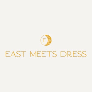 May include: Gold logo with a stylized crescent moon and a floral design. The logo says "East Meets Dress" in a gold font.