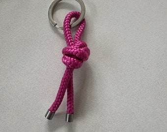 pinker Schlüsselanhänger Knoten