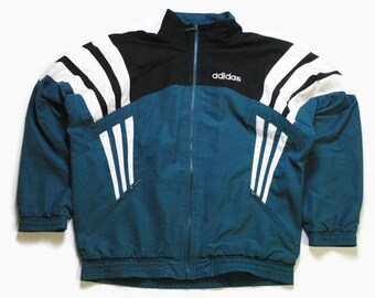 adidas trainingsanzug schwarz mit grünen streifen