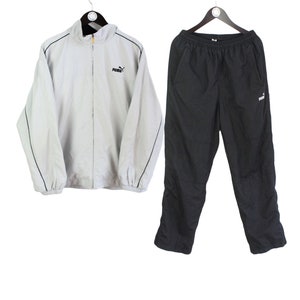 Vintage PUMA Trainingsanzug Größe L Oversize Retro Sport Style rave authentische seltene Herren schwarz graue Jacke und Hose sportlich 90er Jahre Sportanzug
