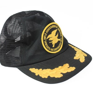 vintage NATIONAL RIFLE Association of America Trucker Cap big logo team black yellow retro authentic 80s summer visor deadstock patch Hat