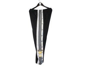 yellow adidas track pants