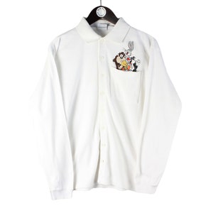 Camiseta polo vintage WARNER Bros Looney Tunes, camisa de manga larga con botones, talla S, estilo de logotipo grande de dibujos animados de los años 90, camiseta básica oficial de la película blanca