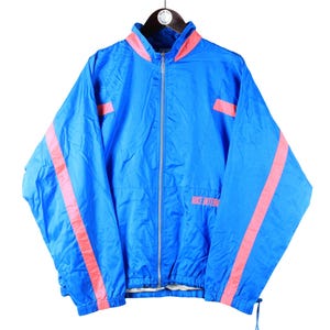 Vintage NIKE International Trainingsjacke authentische Größe M blaues Logo Retro Sport Stil 90er Jahre Laufsport klassisch sportlich Full-Zip leichte Kleidung
