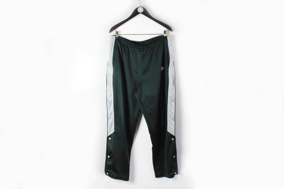 vintage NIKE snap button track pants Size L/XL au… - image 1