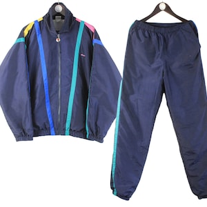 1990s ヴィンテージ ellesse トラックパンツ ネイビー 実寸M程度 テーパード エレッセ 古着 182942443.jpg?cmsp_timestamp=