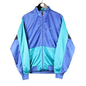 vintage PUMA Trainingsjacke Männer Größe M authentische retro rave style Sport 90er Jahre kleines Logo Windjacke athletische Streetwear Kleidung blau lila