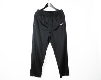 Buy Nike Men Black Solid RISE TEAR AWAY JOGGER 2 Track Pants  Track Pants  for Men 6813971  Myntra