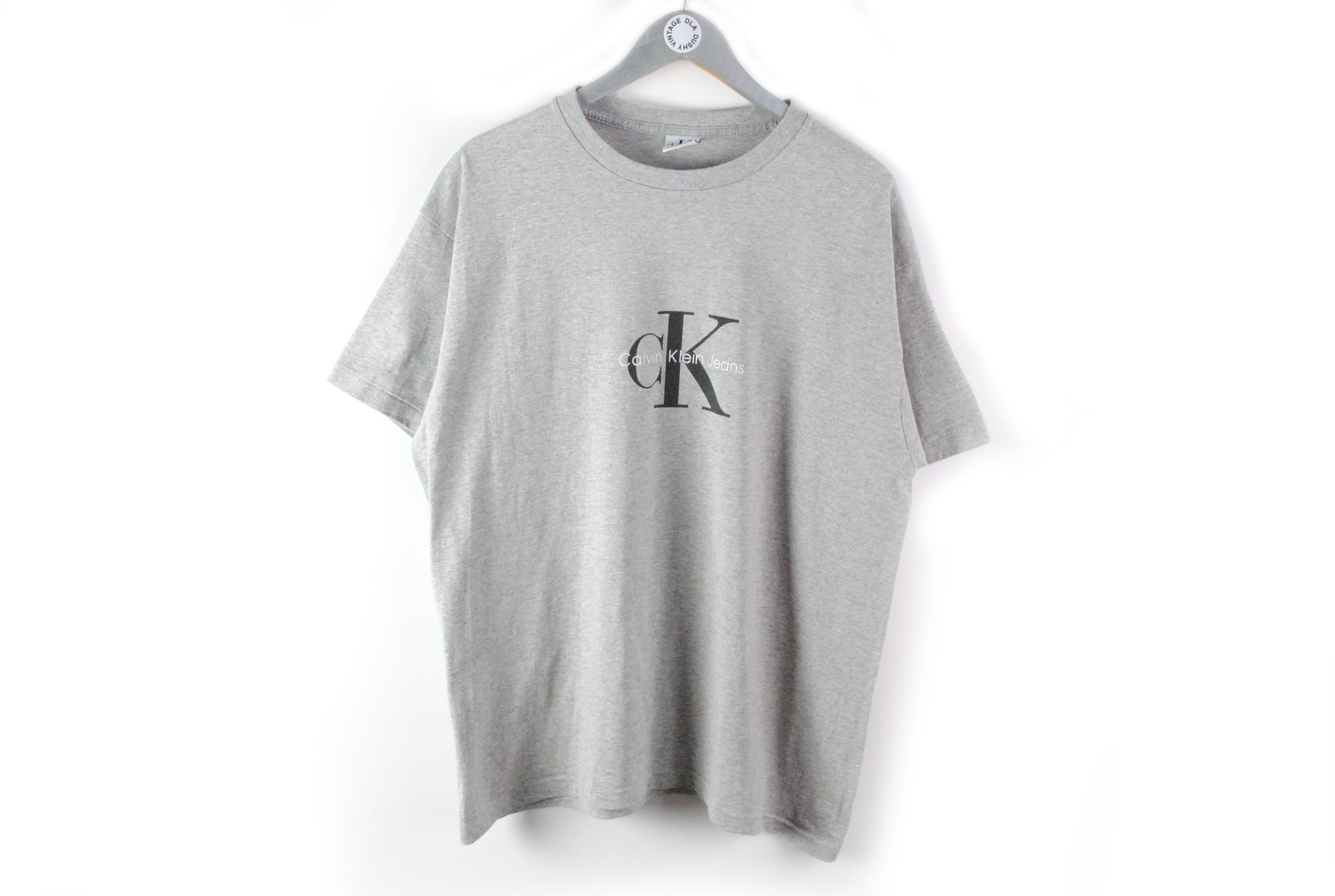 Vintage CALVIN KLEIN T-shirt Big Logo Gray Basic Made in USA Vintage CALVIN KLEIN T-shirt Big Logo Gray Basic Made in USA