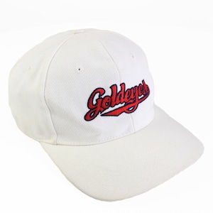 May include: White baseball cap with a red and blue embroidered logo that says "Goldeyes".