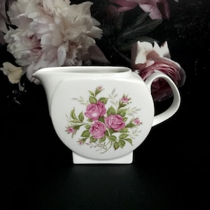 Milk jug by Melitta with floral motif