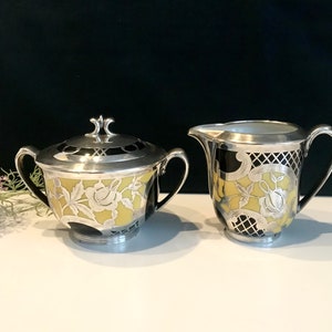 Sugar bowl and creamer Hutschenreuther Hohenberg 1939 - 1945 Sugar bowl and creamer silver plated