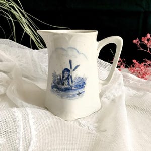 Antique Art Nouveau milk jug / cream jug / milk pourer / windmill motif