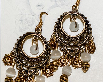 Earrings with opals and gold hooks