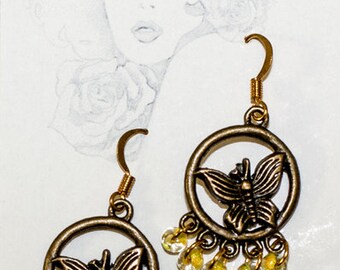 Earrings with glass beads and gold hooks