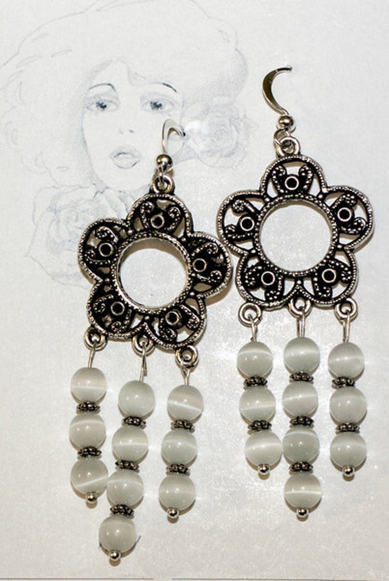 Boucles d'oreilles avec des opales image 1