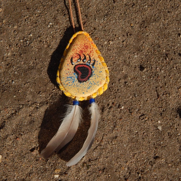 Indian protective amulet made of deer leather with a bear paw, hand-painted